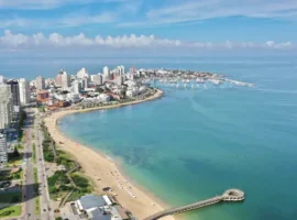 Aerial view of Punta del Este Playa Mansa beach with modern buildings and boats. Punta del Este, Maldonado State, Uruguay