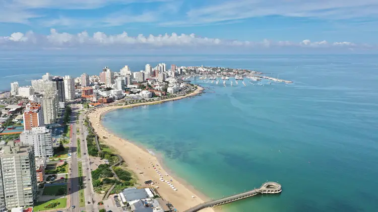 Aerial view of Punta del Este Playa Mansa beach with modern buildings and boats. Punta del Este, Maldonado State, Uruguay