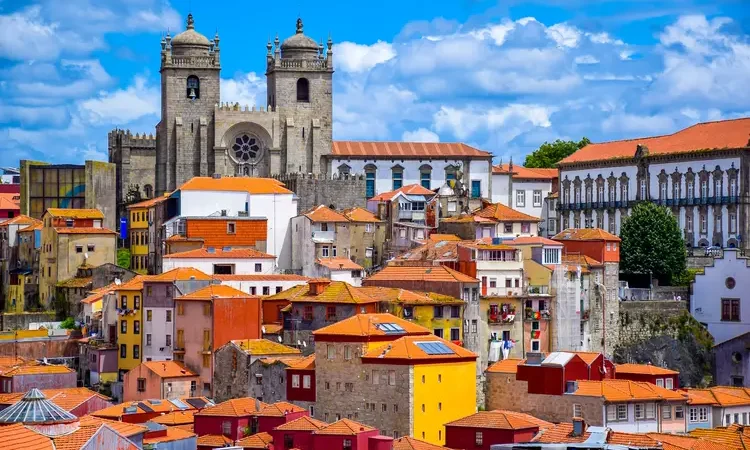 View over the old town of Porto, Portugal with the cathedral and colorful buildings