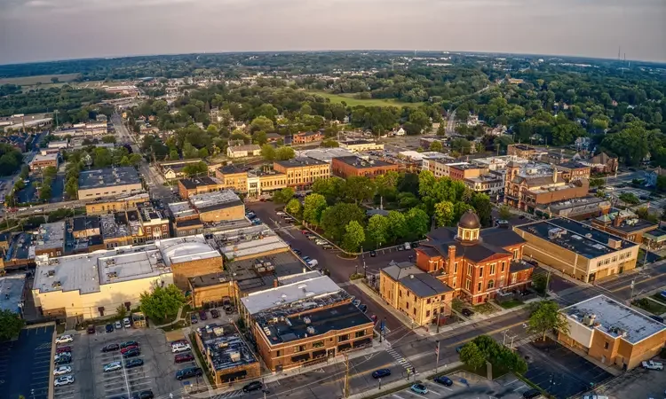 Aerial View of Downtown Woodstock, Illinois during Summer Twilight